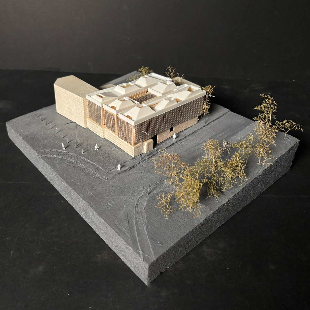 Aerial photo of 1:200 physical model made from foam, plywood, balsa wood, metal mesh, and a 3D printed roof.